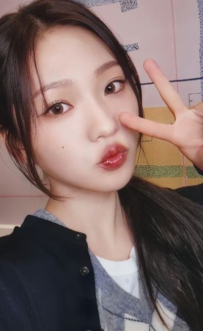 Stella Hearts2Hearts photocard from Preorder